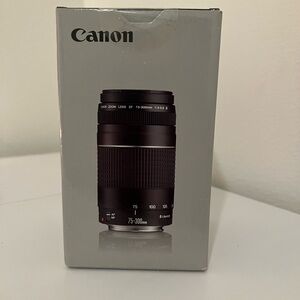 Canon ef 75-300mm 
Black Camera Lens